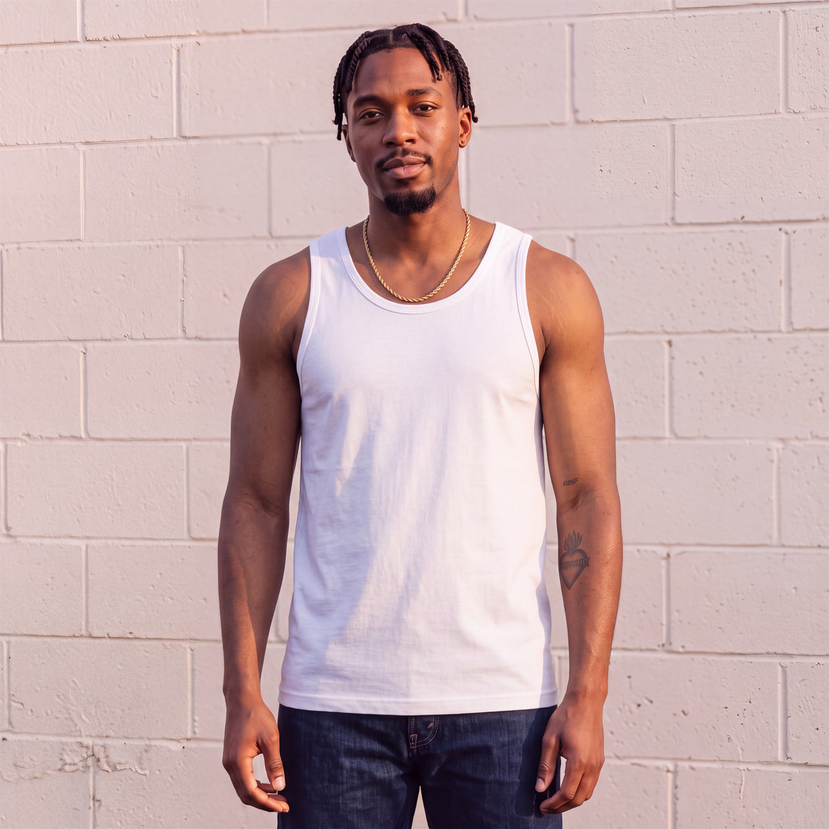 Model wearing Shaka Wear 6.0 Oz Tank Top in White