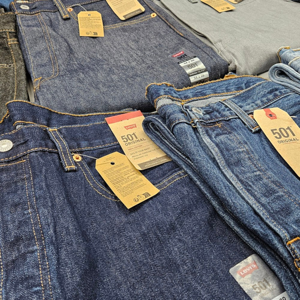 Folded Levi's 501 Original jeans with leather patch labels
